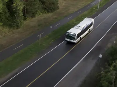 Overhead view of Transit bus travelling down street