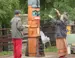 First Nations people rededicating the totem pole