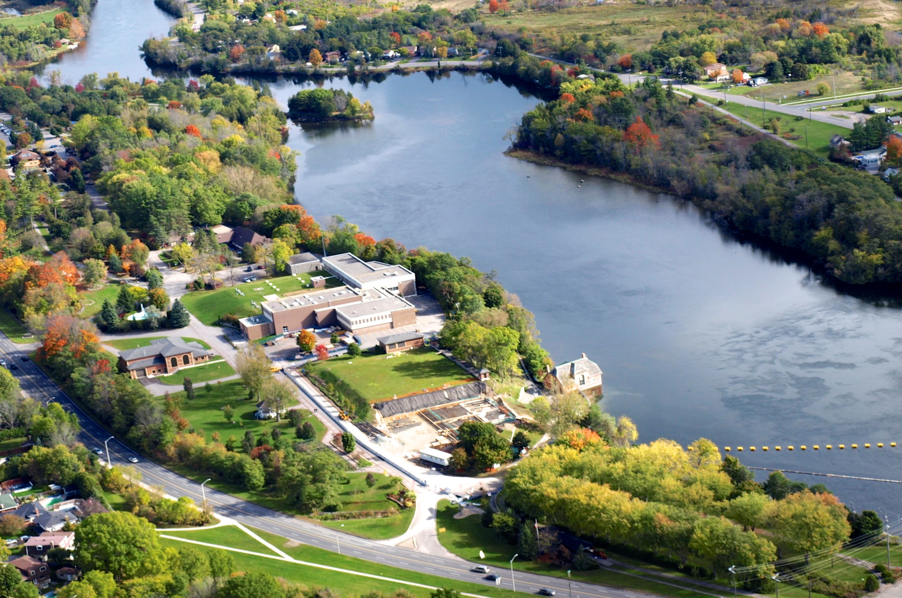 Aerial photo of water treatment plant next to river