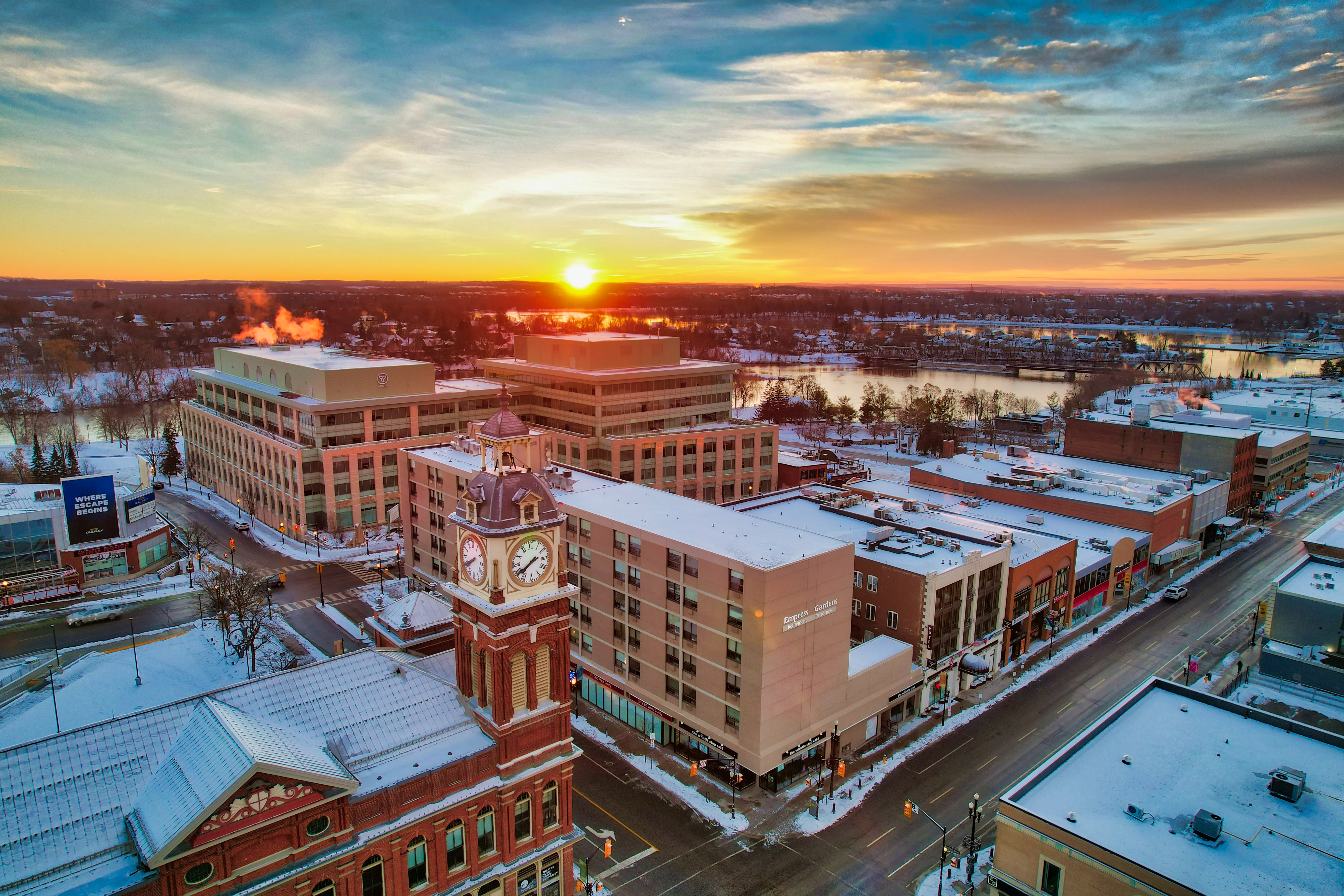 Aerial view of central Peterborough in winter at sunrise, facing east