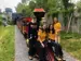 zoo students posing in front of the train
