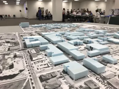 Community meeting with maps